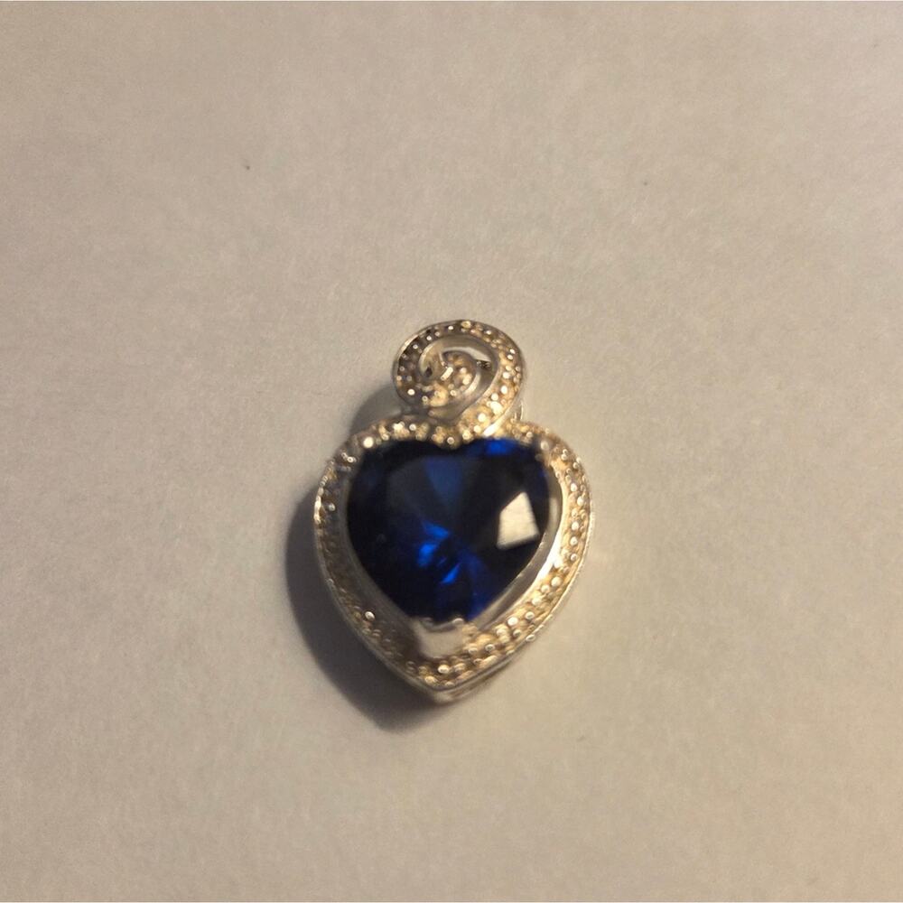 Sapphire Blue Heart Brooch with Silver Accents
